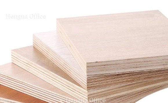 cross section of a multi-layer solid wood bed board showing the glued layers